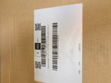 a box with a barcode on it sitting on a table