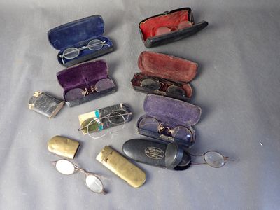 a lot of glasses and a case on the table