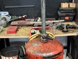 an image of a large red barrel in a garage