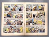 an image of a comic book open to a page with a picture of a man and a woman on it