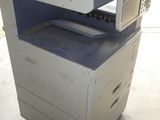 a printer that is sitting on top of a box