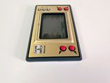 a small electronic device sitting on a white table