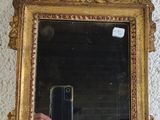 a person taking a picture of themselves in a mirror