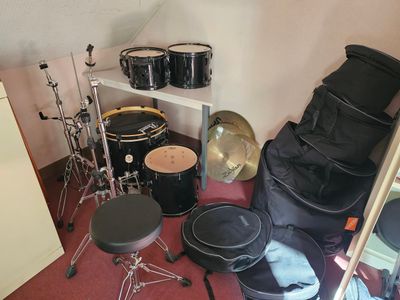 a lot of drums and drums in a room