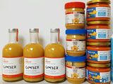 many jars of food that are sitting on a table