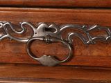a close up of a drawer with a handle on it