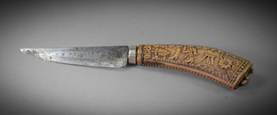 a knife that is sitting on top of a table