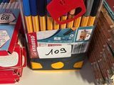a lot of school supplies on the shelf in the store