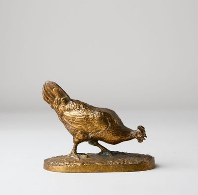 bronze sculpture of a bird on a base