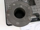 a piece of metal sitting on top of a piece of paper