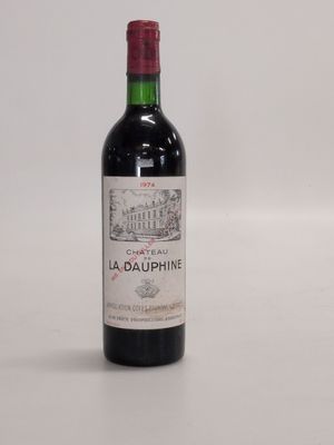 a bottle of wine that is sitting on a table