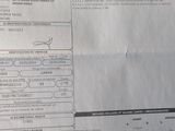 une feuille sur laquelle figure l'image d'une voiture