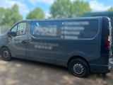 an image of a van parked in a parking lot
