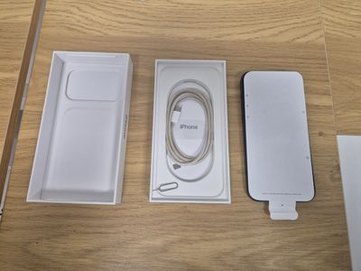 a box with a charger, a cable, and a charger attached to it