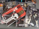 a lot of comic books on a table
