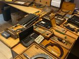 a lot of tools that are sitting on a table