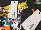 a t - shirt with a picture of a mountain scene on it