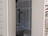 a mirror that is on the wall in the room