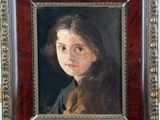 portrait of a young girl in a brown coat by person