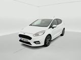 a white ford fiesta parked in a white room