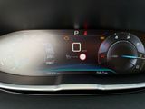 the dashboard of a car with a digital display on it