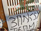 a sign on the back of a machine that says stink ' s the time