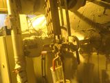 pipes and valves in the room of a large building