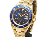 an image of a gold wrist watch with a blue dial