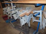 many pieces of wood on a metal rack in a room