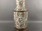 an image of a vase with a lid on a stand