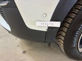 a close up of a car with a sticker on it ' s bumper