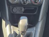 a close up of a car ' s gear lever in the center console