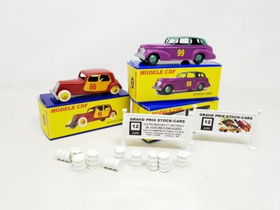 three toy cars that are sitting on top of each other