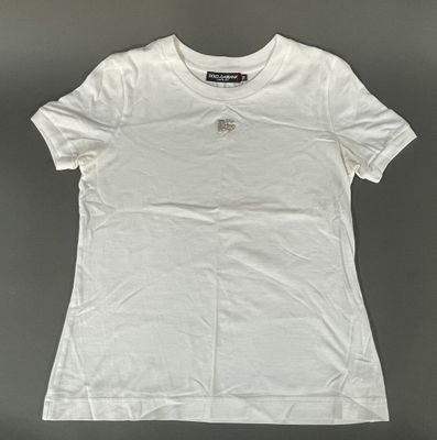 a white t - shirt with a picture of a dog on it