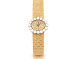 une montre-bracelet en or 18 carats sertie de diamants