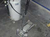 a water heater sitting on the floor in a room
