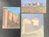three paintings of buildings on a black surface with a sky background