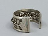 an image of a silver ring with a stone in the middle