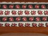 an image of a table runner with roses on it