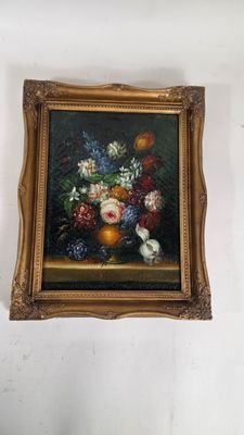 a picture of a painting of flowers and fruit on the wall
