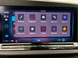 a picture of a car dashboard with a touch screen