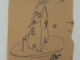 a drawing of a house on a plate on a table