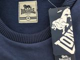a close up of a t - shirt with a tag on it
