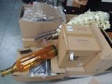 a box with a bottle of wine and a bunch of other boxes