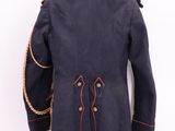 an old military jacket with a red line on the chest