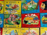 many children ' s books that are on the floor together