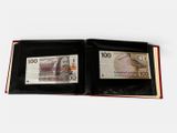 a black wallet with a picture of a bird on it