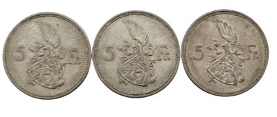 trois souverains d'argent britanniques, dont l'un représente un lion et l'autre un lion