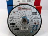 a close up of a disc on a table next to a box