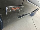 a close up of a car with a sticker on it ' s bumper